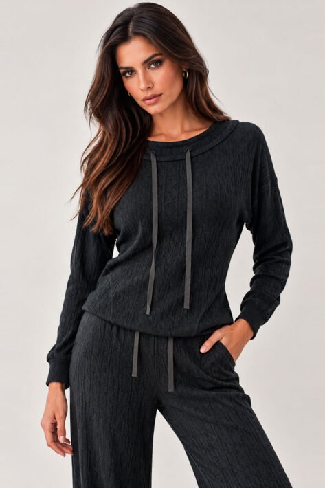 Blusa negra tejida de punto | elegancia y distinción